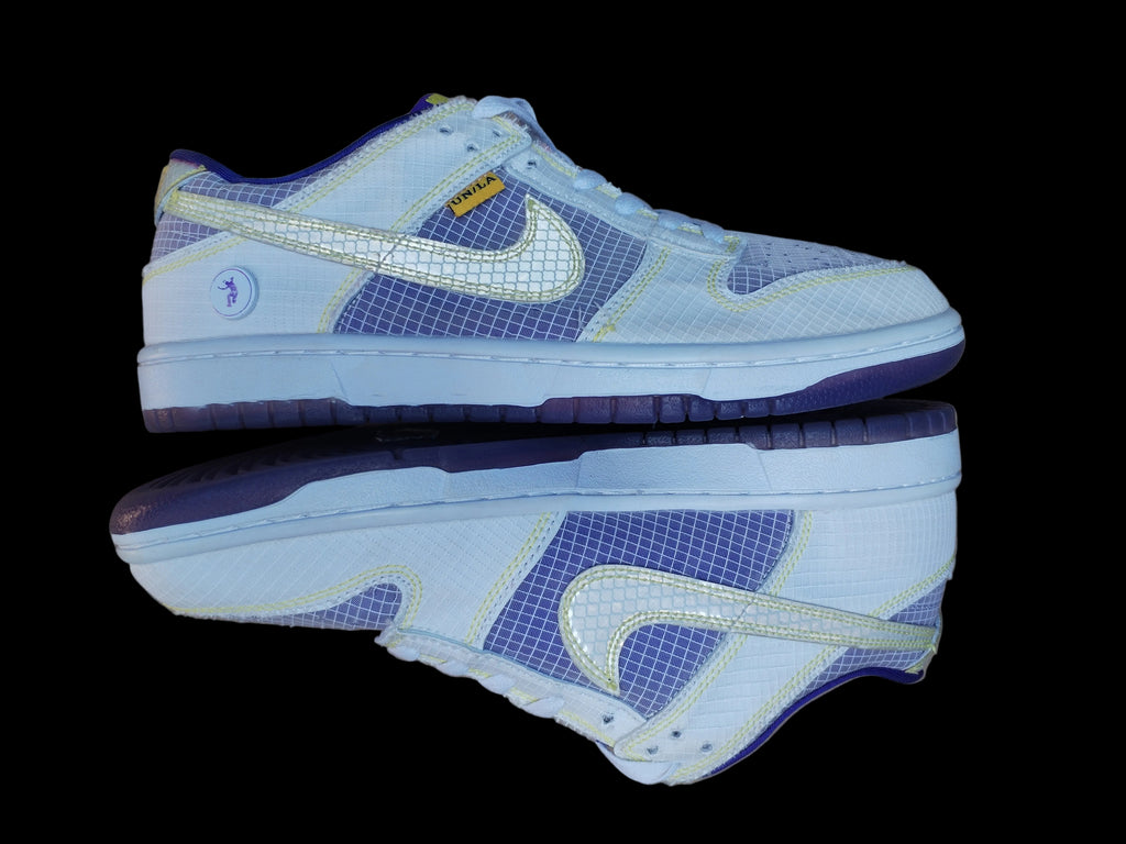 Nike Dunk Low Union LA Court Purple vista lateral con suela